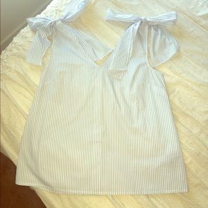 Sleeveless Top with Bow Detail